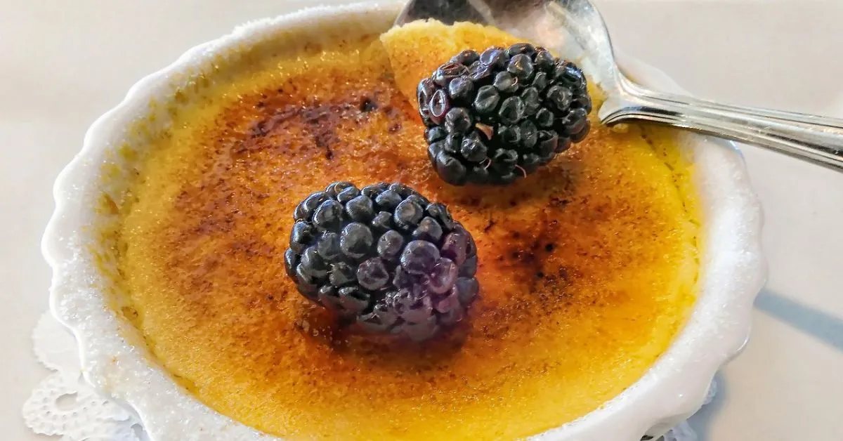 Crab Brulee with a crispy caramelized topping in a ramekin